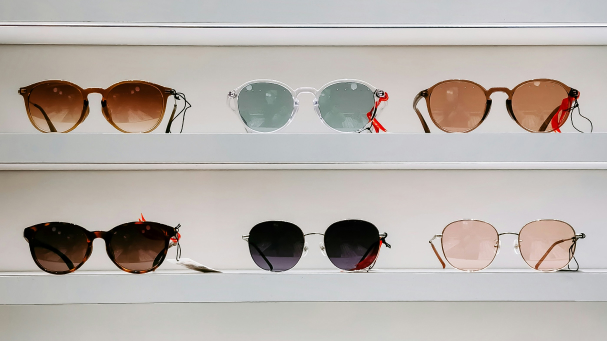 Sunglasses on shelves